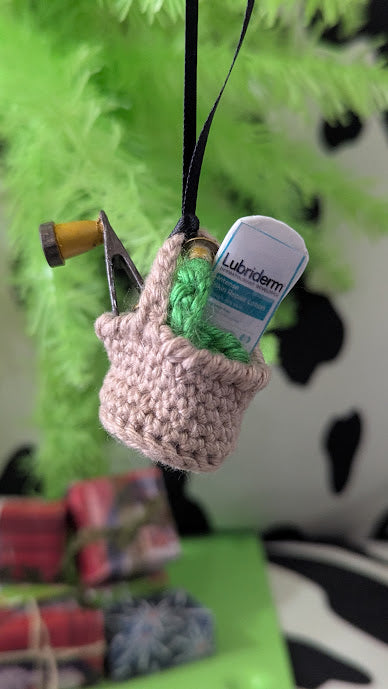 A Miniature Holiday Ornament Lotion in the Basket